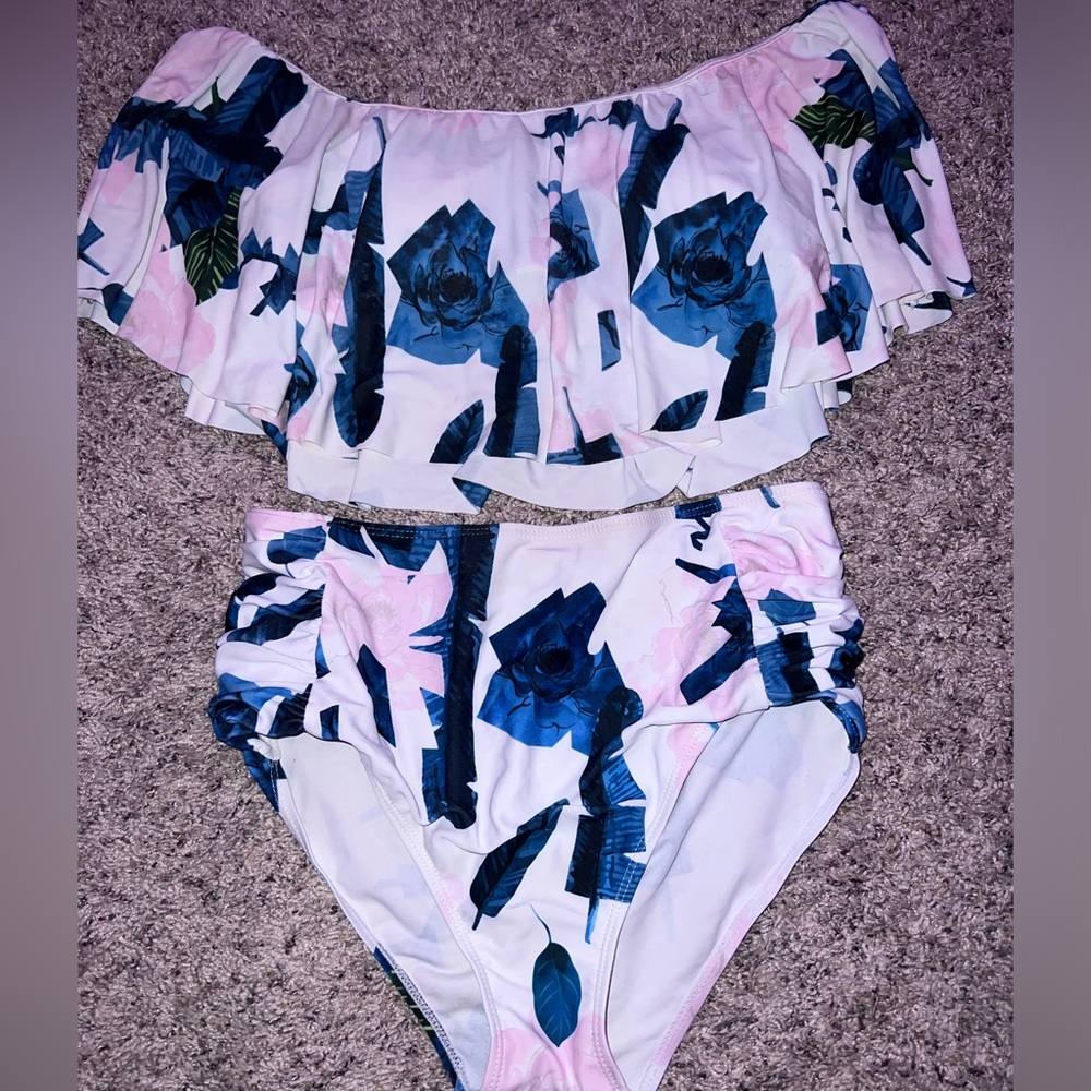 Two piece high waisted bathing suit/ top is off the shoulders